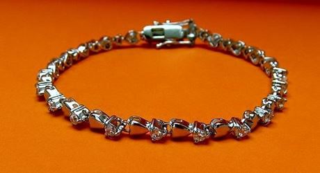 Afbeeldingen van “Een hart voor zirkonia” tennisarmband in sterling zilver en ronde kubiek zirkonia