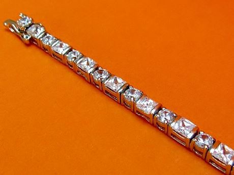 Afbeeldingen van “Klassieke zirkonia” tennisarmband in sterling zilver met ronde en vierkante kubiek zirkonia