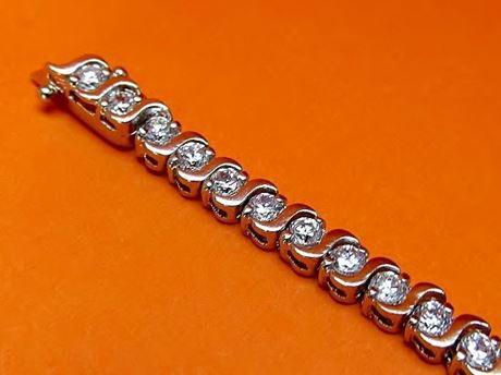 Picture of “Dashing Zirconia” tennis bracelet in sterling silver and round cubic zirconia with wave dashes