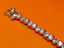 Picture of “Ying Yang Zirconia ” tennis bracelet in sterling silver,  a row of round cubic zirconia connected in ying yang