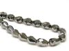 Picture of 10x7 mm, Czech faceted tear-shaped beads, black, opaque, gunmetal luster