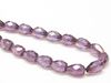 Image de 10x7 mm, perles à facettes tchèques gouttes, transparentes, lustrées violet alexandrite