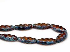 Picture of 18x7 mm, carved, flat spindle-shaped Czech beads, amber brown, transparent, blue picasso, 6 pieces