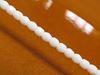 Picture of 3x3 mm, Czech faceted round beads, chalk white, opaque