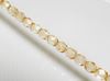 Picture of 6x6 mm, Czech faceted round beads, transparent, champagne beige luster