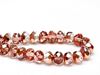 Picture of 6x8 mm, Czech faceted rondelle beads, crystal, transparent, half tone rose gold mirror