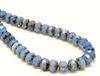 Picture of 6x8 mm, Czech faceted rondelle beads, light opal royal blue, translucent, travertine