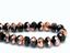 Image de 6x9 mm, perles à facettes tchèques rondelles, noires, opaques, miroir partiel or rose
