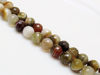 Picture of 10x10 mm, round, gemstone beads, natural striped agate, shades of moss green, faceted