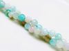 Picture of 6x6 mm, round, gemstone beads, natural striped agate, light turquoise blue, faceted