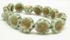 Image de 14x14 mm, perles de verre pressé tchèque, fleur hawaïenne, vert céladon, mat, patine dorée à l'ancienne