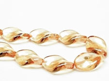 Picture of 19x13 mm, Czech druk beads, twisted leaf, transparent, champagne beige luster, 12 pieces