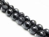 Picture of 10x10 mm, round, gemstone beads, onyx, black, large shiny facets on frosted round background