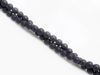 Picture of 4x4 mm, round, gemstone beads, onyx, black, A-grade, frosted