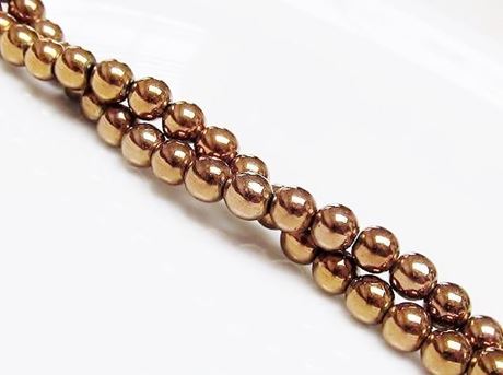 Picture of 8x8 mm, round, gemstone beads, hematite, rose gold metalized