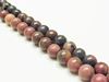 Picture of 8x8 mm, round, gemstone beads, rhodonite with manganese oxide, natural