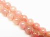 Picture of 6x6 mm, round, gemstone beads, ruby quartz, natural, B+-grade