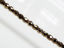 Picture of 3x3 mm, Czech faceted round beads, black, opaque, golden luster