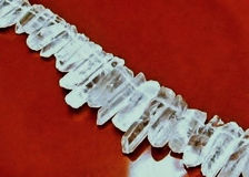 Picture of 10x15-10x35 mm, faceted long chips, gemstone beads, quartz, rock crystal, natural, rough, one strand