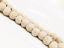 Picture of 8x8 mm, round, gemstone beads, lava rock, dyed off-white
