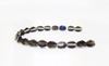 Picture of 5x3 mm, Pinch beads, Czech glass, smoke grey, transparent, half tone Azuro