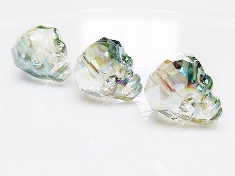 Picture of 14x10 mm, glass bead, faceted skull, crystal, transparent, green iris