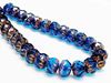 Picture of 7x10 mm, carved cruller beads, Czech, deep sky blue, transparent, rusty bronze