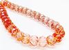 Picture of 7x10 mm, carved cruller beads, Czech, transparent, light topaz pink luster