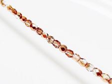 Picture of 4x4 mm, Czech faceted round beads, crystal, transparent, half tone rose gold mirror