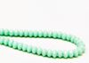 Picture of 3x5 mm, Czech faceted rondelle beads, light turquoise green, opaque