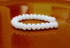 Picture of 3x5 mm, Czech faceted rondelle beads, alabaster white, translucent