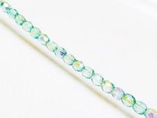 Picture of 4x4 mm, Czech faceted round beads, transparent, light emerald green shimmering