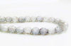 Picture of 6x6 mm, Czech faceted round beads, crystal, transparent, silver rain, pre-strung