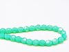 Picture of 6x6 mm, Czech faceted round beads, light turquoise green, translucent, opalescent