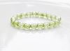 Picture of 4x4 mm, Czech faceted round beads, frosted crystal, translucent, celadon green luster