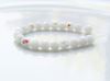 Picture of 4x4 mm, Czech faceted round beads, chalk white, opaque, AB