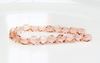 Picture of 6x6 mm, Czech two-way cut beads, peachy pink, transparent