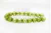 Picture of 6x6 mm, Czech multi-cut beads, light peridot green, transparent, picasso finishing