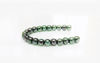 Picture of 4x4 mm, round, Czech druk beads, light emerald green, transparent, silvery purple luster