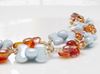 Picture of 6x8 mm, CoCo, Czech druk beads, crystal, transparent, apricot cream orange luster