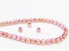 Picture of 4x4 mm, round, Czech druk beads, transparent, light topaz pink luster