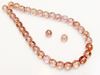 Picture of 6x6 mm, round, Czech druk beads, transparent, light topaz pink luster