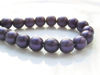 Picture of 8x8 mm, round, Czech druk beads, black, opaque, deep purple satin finishing, pre-strung, 25 beads