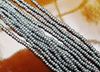 Picture of Czech seed beads, size 11/0, pre-strung, shiny silver, opaque