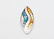 Picture of “Sand and sea” ellipse shaped slide pendant in sterling silver inlaid with waves of mother of pearl in white, yellow ocher and grey blue