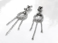 Picture of “Framed crystal drop” earrings in sterling silver,  a crystal drop suspended in a tear-shaped loop with CZ