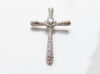 Picture of “Textured Byzantine Cross” slide pendant in sterling silver of which the center is decorated with round cubic zirconia in the shape of a flower 