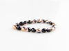 Picture of 3x3 mm, Czech faceted round beads, black, opaque, half tone rose gold mirror