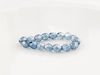 Picture of 4x4 mm, Czech faceted round beads, transparent, light Montana blue luster