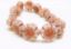 Image de 14x14 mm, perles de verre pressé tchèque, fleur hawaïenne, gris argenté, mat, patine à effet or rose